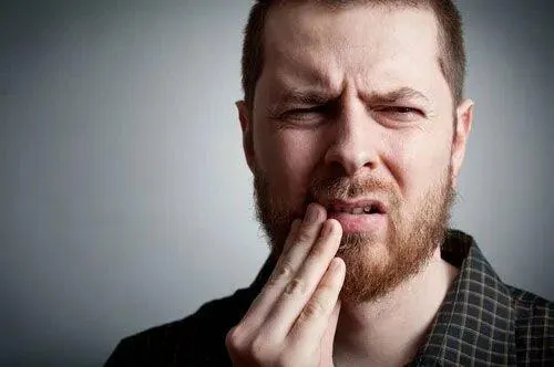 Dental crown restoration used to fix a broken tooth
