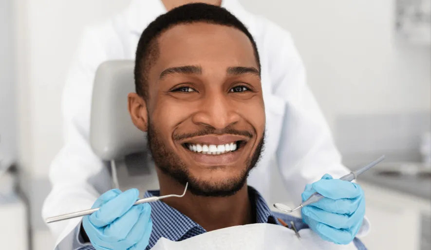 Client sitting in the dentist office chair