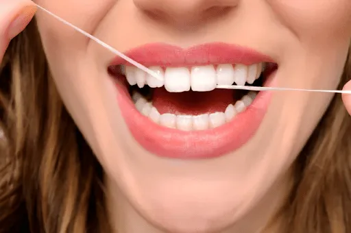 Illustration asking how often you should floss your teeth
