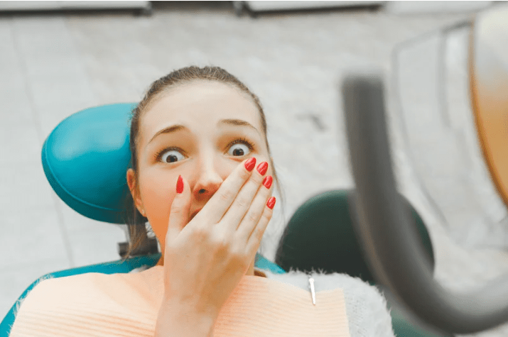 woman at dentist with dental phobia