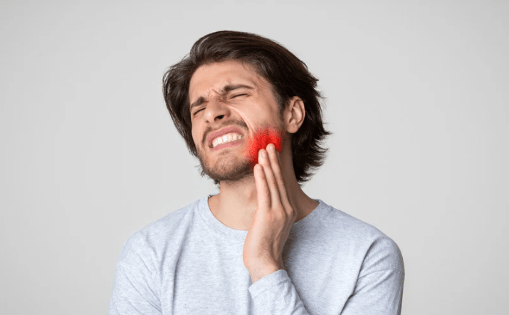 man dealing with grinding teeth