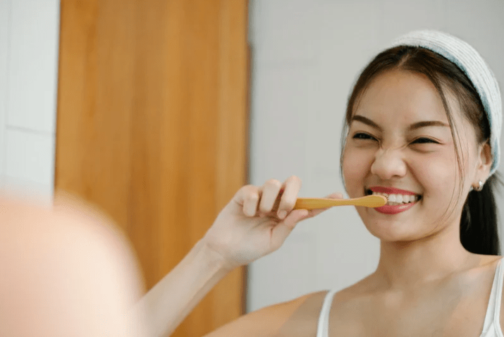 girl with toothbrush